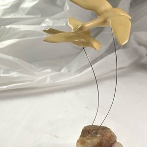 Vintage Marvin Wernick kinetic seagulls in flight on onyx base.